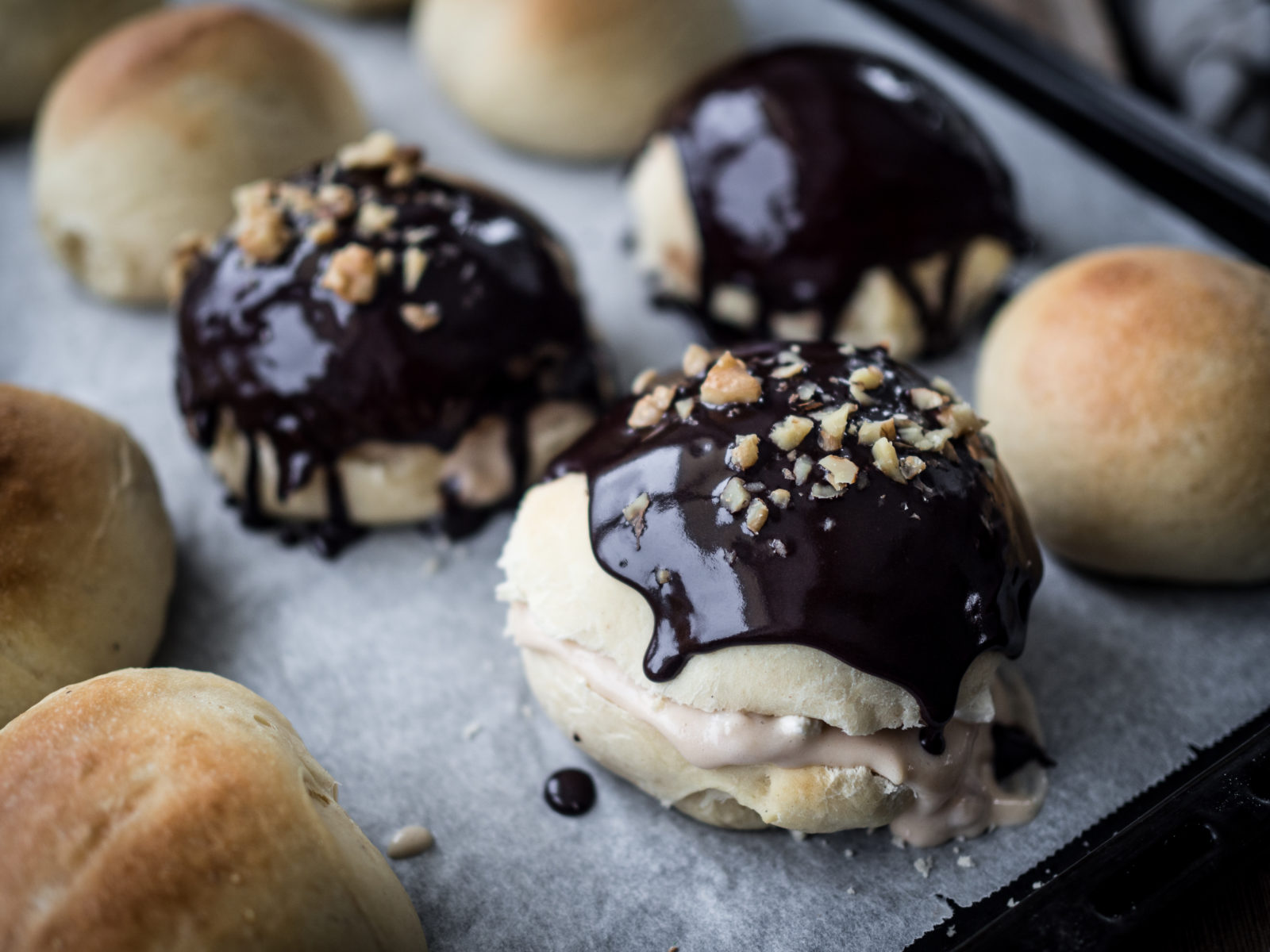 Sweet Buns with a Chocolate Glaze, Walnut Custard and Cream (Fastelavnsboller med valnøtterkrem og sjokoladeglasur)