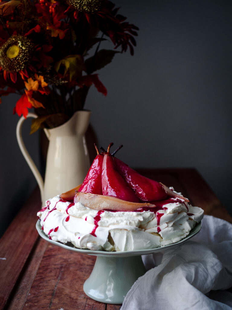 Lingonberry-Poached Pear Pavlova