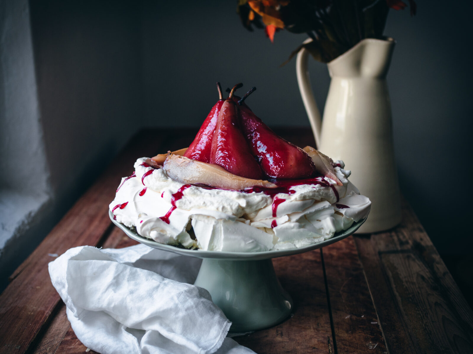 Lingonberry-Poached Pear Pavlova